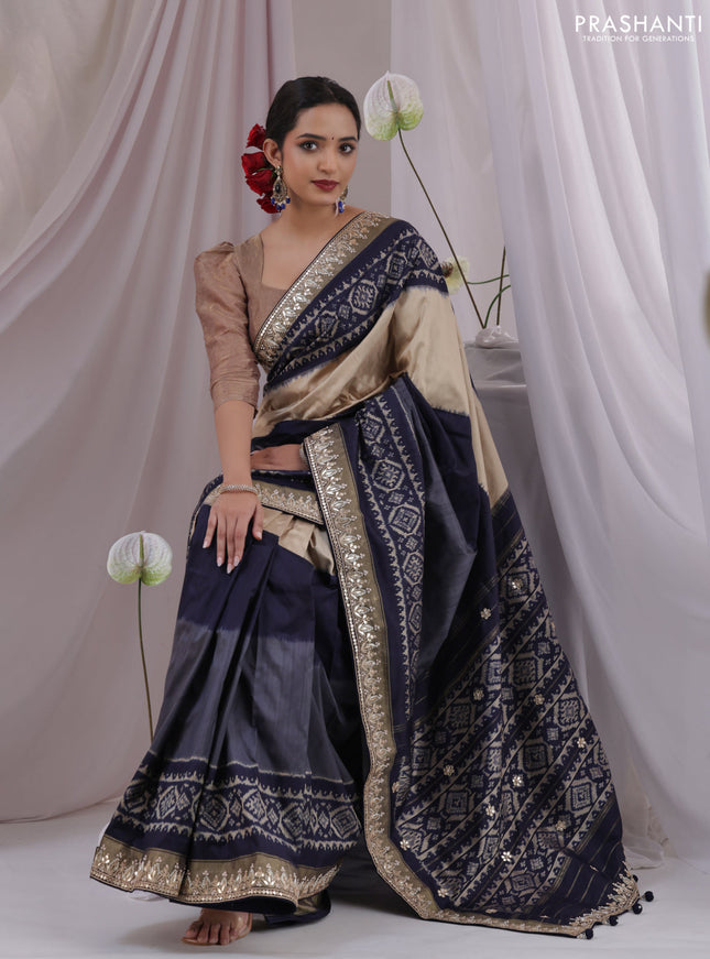 Grey-navy blue pochampally silk saree with allover ikat weaves and Embroidered border