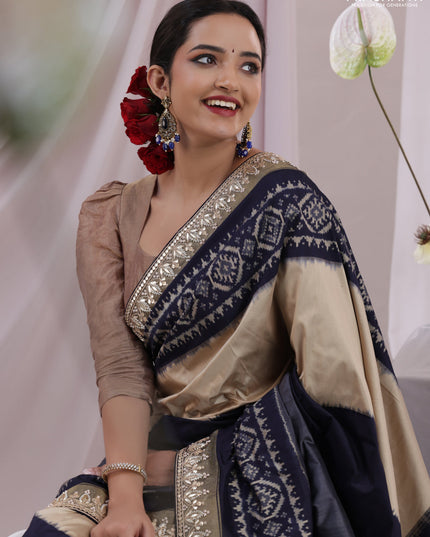 Grey-navy blue pochampally silk saree with allover ikat weaves and Embroidered border