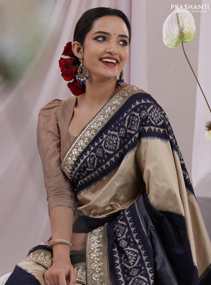 Grey-navy blue pochampally silk saree with allover ikat weaves and Embroidered border