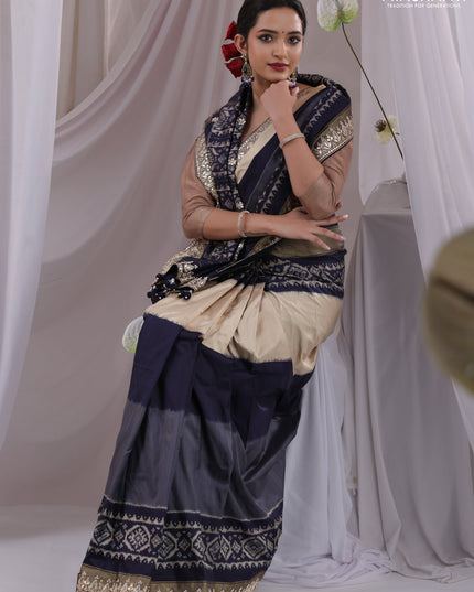 Grey-navy blue pochampally silk saree with allover ikat weaves and Embroidered border