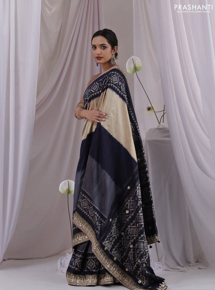 Grey-navy blue pochampally silk saree with allover ikat weaves and Embroidered border