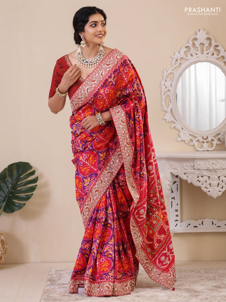 Pink Pochampally silk saree with allover ikat weaves and Embroidered border