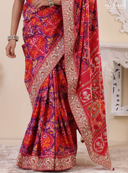 Pink Pochampally silk saree with allover ikat weaves and Embroidered border