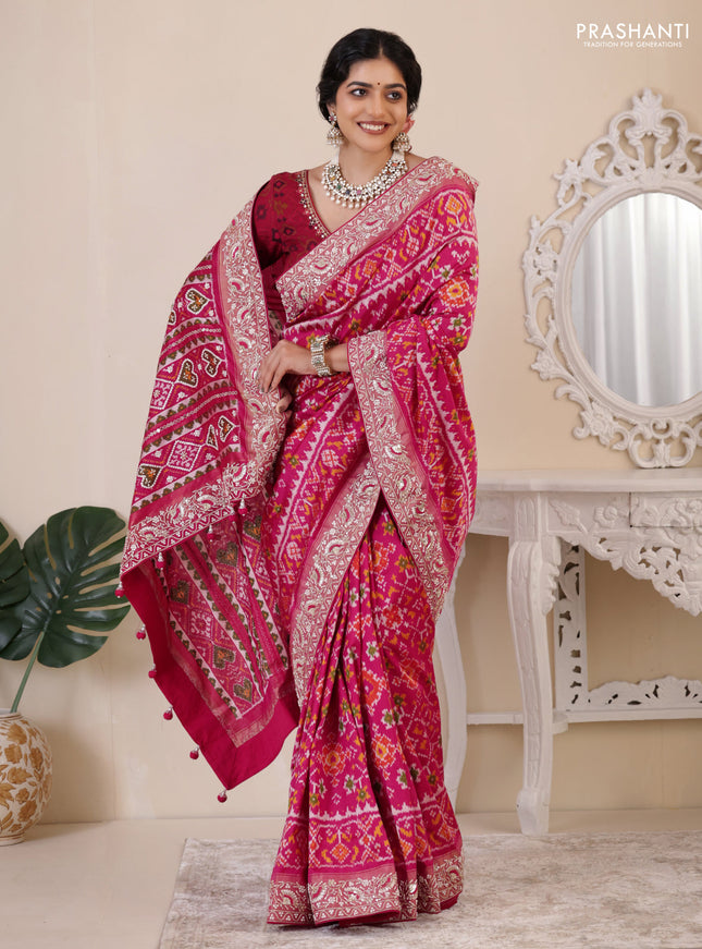 Pink Pochampally silk saree with allover ikat weaves and Embroidered border