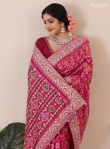 Pink Pochampally silk saree with allover ikat weaves and Embroidered border