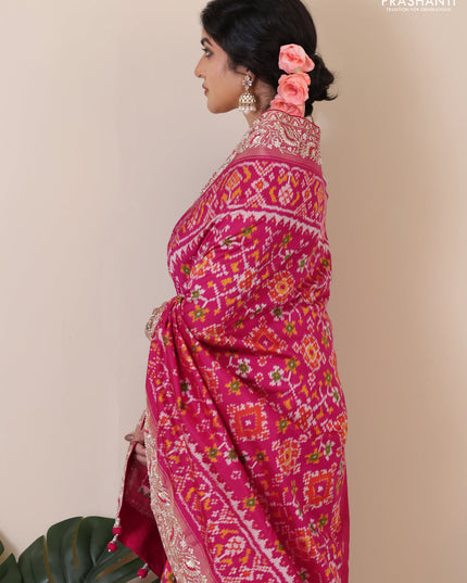 Pink Pochampally silk saree with allover ikat weaves and Embroidered border