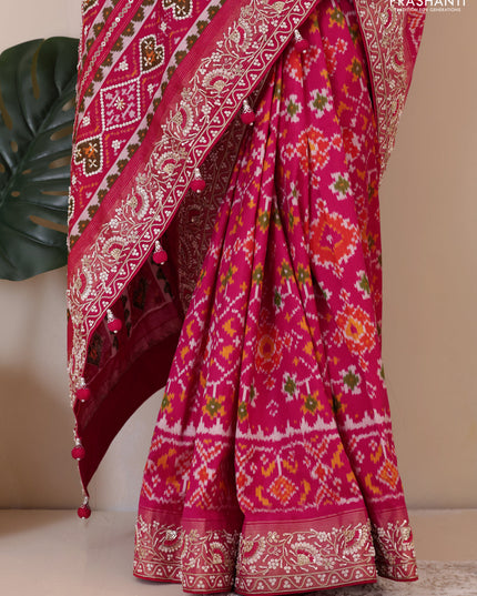 Pink Pochampally silk saree with allover ikat weaves and Embroidered border