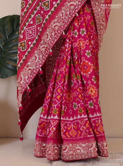 Pink Pochampally silk saree with allover ikat weaves and Embroidered border