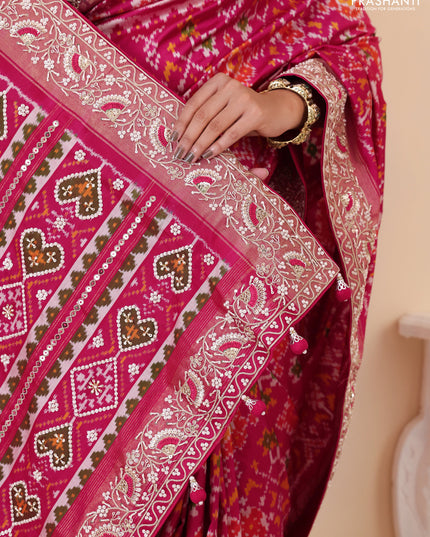 Pink Pochampally silk saree with allover ikat weaves and Embroidered border
