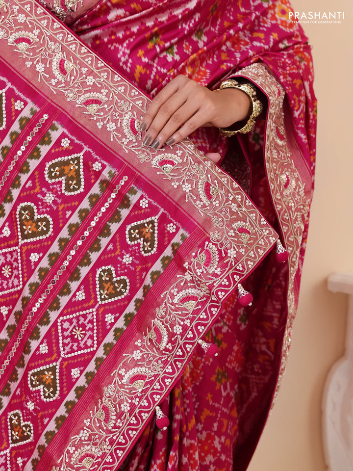 Pink Pochampally silk saree with allover ikat weaves and Embroidered border