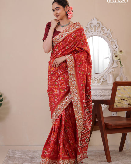 Red Pochampally silk saree with allover ikat weaves and Embroidered border