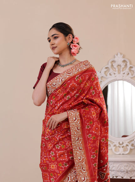 Red Pochampally silk saree with allover ikat weaves and Embroidered border