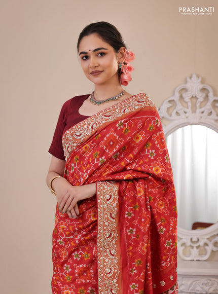 Red Pochampally silk saree with allover ikat weaves and Embroidered border
