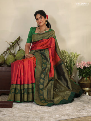 Pinkish orange-Green Pure kanchipuram silk saree with zari woven buttas & long zari woven border