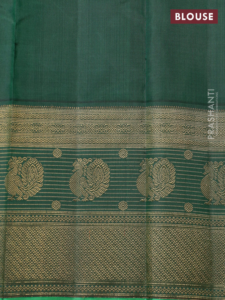 Pinkish orange-Green Pure kanchipuram silk saree with zari woven buttas & long zari woven border