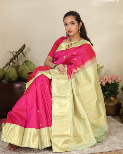 Pink-Light green Pure kanchipuram silk saree with zari woven buttas & zari woven border