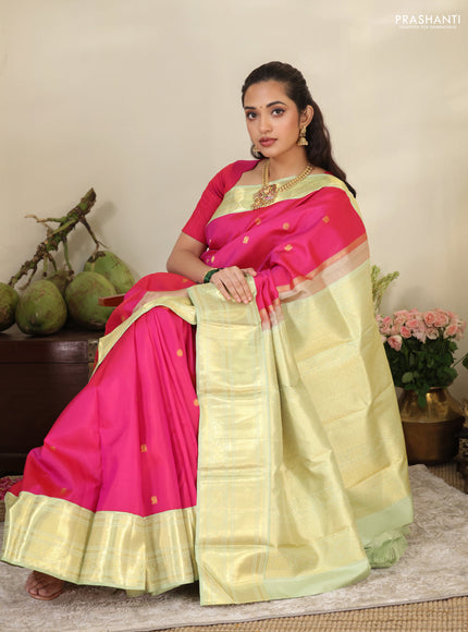 Pink-Light green Pure kanchipuram silk saree with zari woven buttas & zari woven border