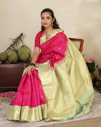 Pink-Light green Pure kanchipuram silk saree with zari woven buttas & zari woven border