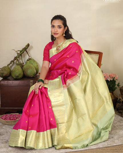 Pink-Light green Pure kanchipuram silk saree with zari woven buttas & zari woven border