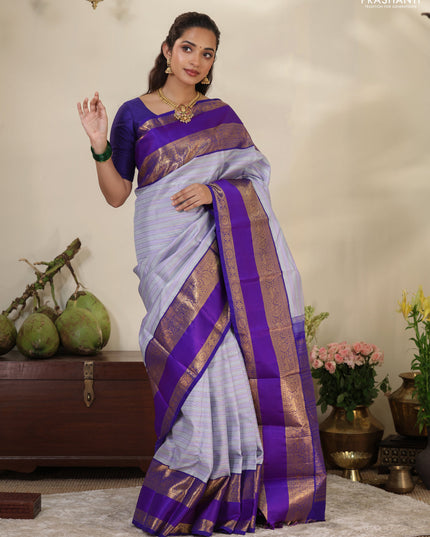 Pastel grey-Violet Pure Kanchipuram silk saree with allover stripes pattern & long zari woven border