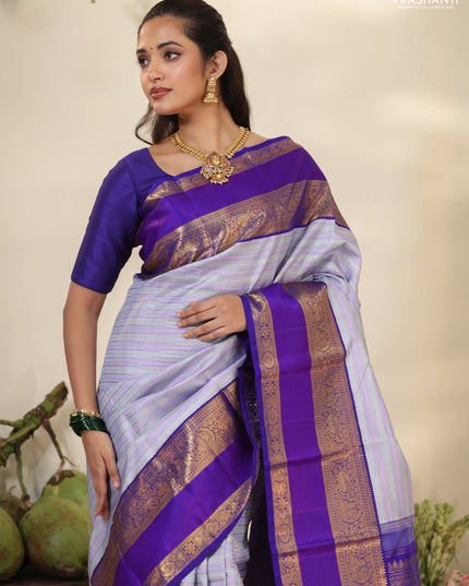 Pastel grey-Violet Pure Kanchipuram silk saree with allover stripes pattern & long zari woven border