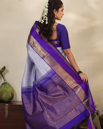 Pastel grey-Violet Pure Kanchipuram silk saree with allover stripes pattern & long zari woven border