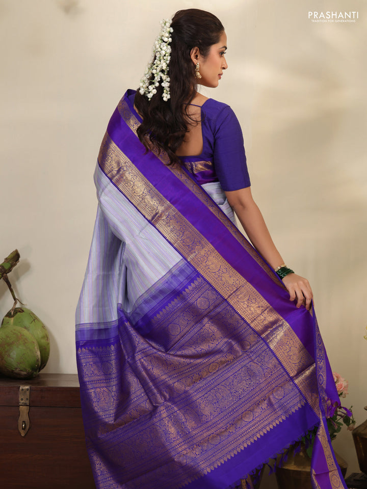 Pastel grey-Violet Pure Kanchipuram silk saree with allover stripes pattern & long zari woven border