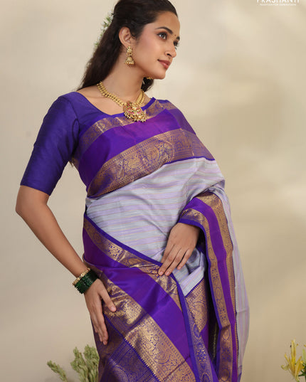 Pastel grey-Violet Pure Kanchipuram silk saree with allover stripes pattern & long zari woven border