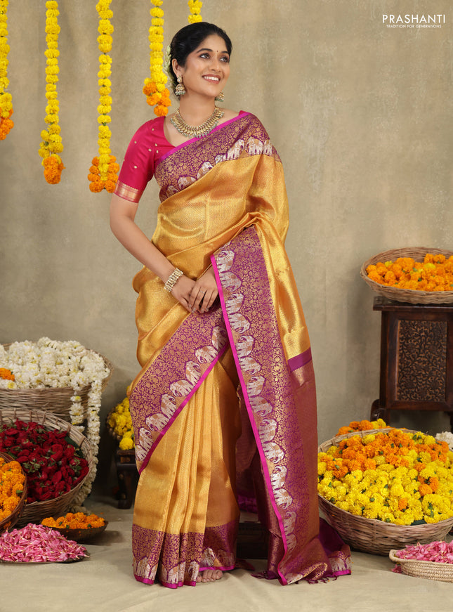 Gold-Purple Pure Tissue kanchipuram silk saree with allover zari woven brocade weaves & elephant design zari border