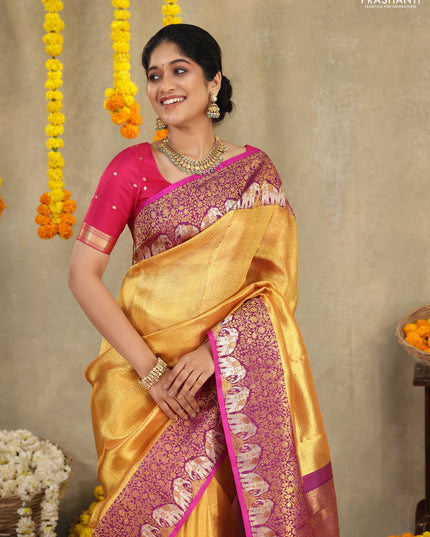 Gold-Purple Pure Tissue kanchipuram silk saree with allover zari woven brocade weaves & elephant design zari border