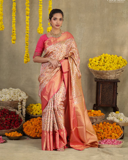 Mild peach-Pink Pure kanchipuram tissue silk saree with allover mina weaves & zari woven border