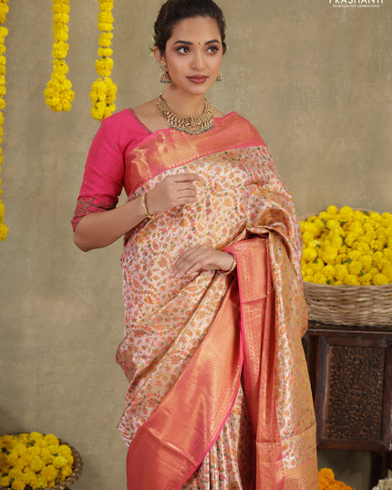 Mild peach-Pink Pure kanchipuram tissue silk saree with allover mina weaves & zari woven border