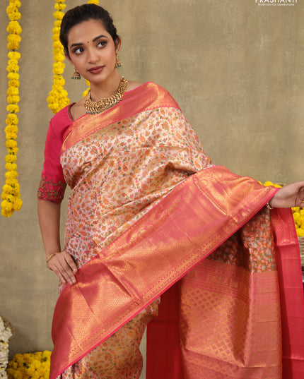 Mild peach-Pink Pure kanchipuram tissue silk saree with allover mina weaves & zari woven border