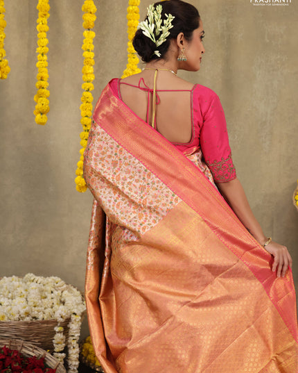 Mild peach-Pink Pure kanchipuram tissue silk saree with allover mina weaves & zari woven border
