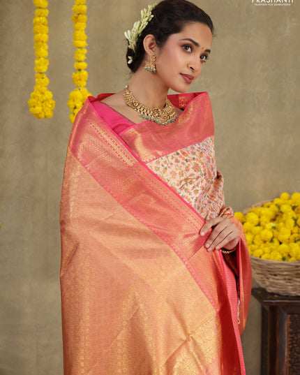 Mild peach-Pink Pure kanchipuram tissue silk saree with allover mina weaves & zari woven border