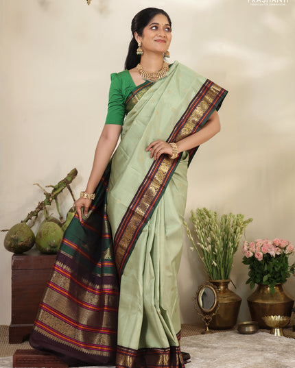 Pastel Green-Deep wine Pure kanchipuram silk saree with zari woven buttas & elephant zari woven border