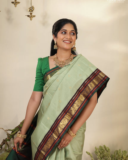 Pastel Green-Deep wine Pure kanchipuram silk saree with zari woven buttas & elephant zari woven border