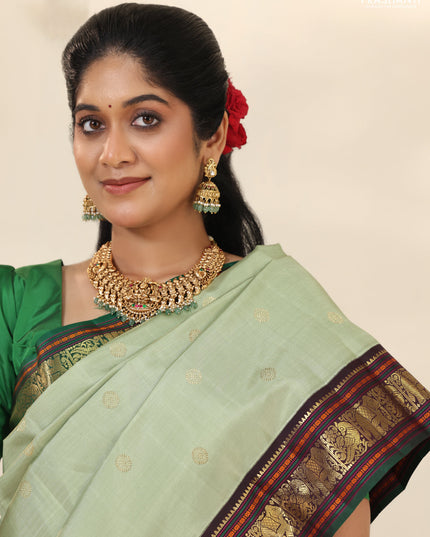 Pastel Green-Deep wine Pure kanchipuram silk saree with zari woven buttas & elephant zari woven border