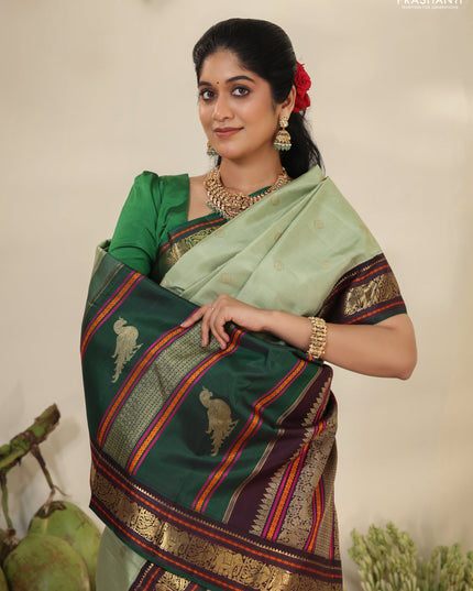 Pastel Green-Deep wine Pure kanchipuram silk saree with zari woven buttas & elephant zari woven border