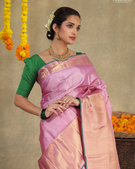 Light pink-Green Pure Kanchipuram silk saree With allover zari stripes pattern & long zari woven border