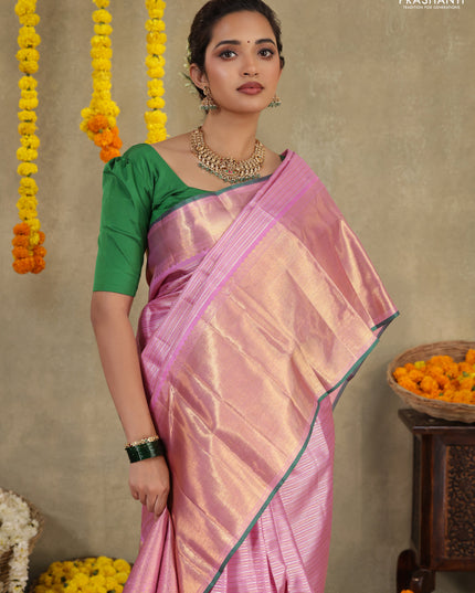 Light pink-Green Pure Kanchipuram silk saree With allover zari stripes pattern & long zari woven border