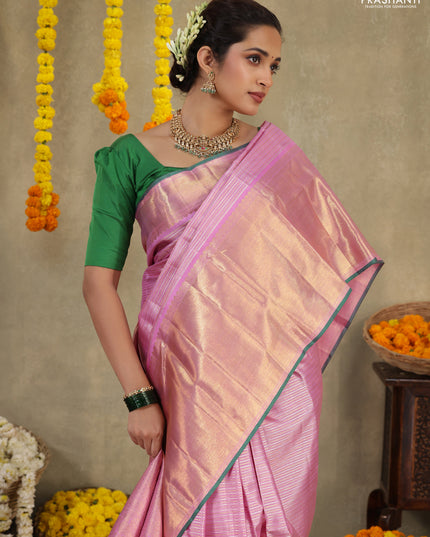 Light pink-Green Pure Kanchipuram silk saree With allover zari stripes pattern & long zari woven border