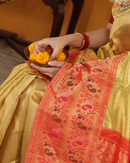Gold-Red Pure Tissue Kanchipuram silk saree with zari weaves and long rich paithani style border