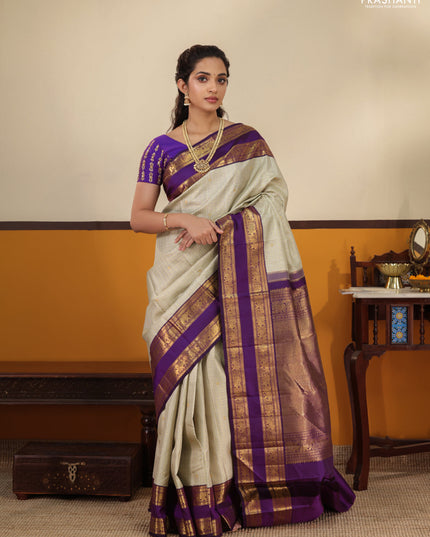 Pista Green-Purple Pure Kanchipuram Silk Saree with Allover zari checks & buttas and Rettapet zari woven border