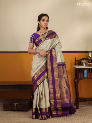 Pista Green-Purple Pure Kanchipuram Silk Saree with Allover zari checks & buttas and Rettapet zari woven border