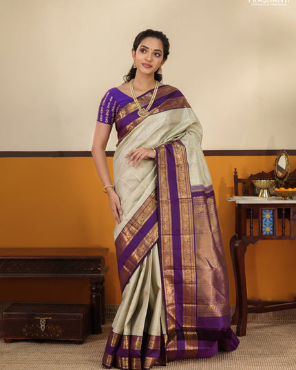 Pista Green-Purple Pure Kanchipuram Silk Saree with Allover zari checks & buttas and Rettapet zari woven border