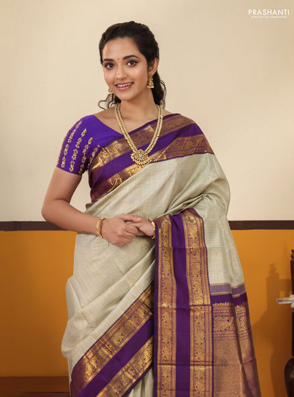 Beige-Purple Pure Kanchipuram Silk Saree with Allover zari checks & buttas and Rettapet zari woven border