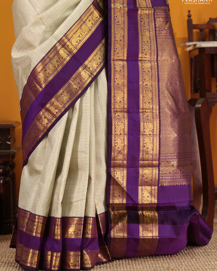 Pista Green-Purple Pure Kanchipuram Silk Saree with Allover zari checks & buttas and Rettapet zari woven border
