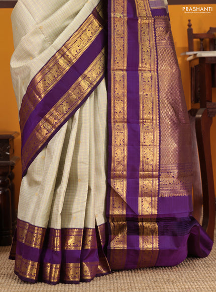 Beige-Purple Pure Kanchipuram Silk Saree with Allover zari checks & buttas and Rettapet zari woven border