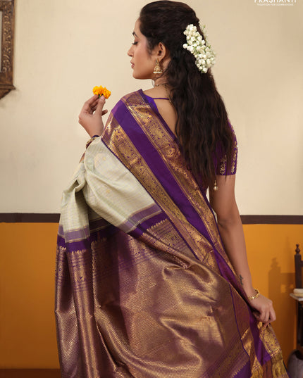 Pista Green-Purple Pure Kanchipuram Silk Saree with Allover zari checks & buttas and Rettapet zari woven border